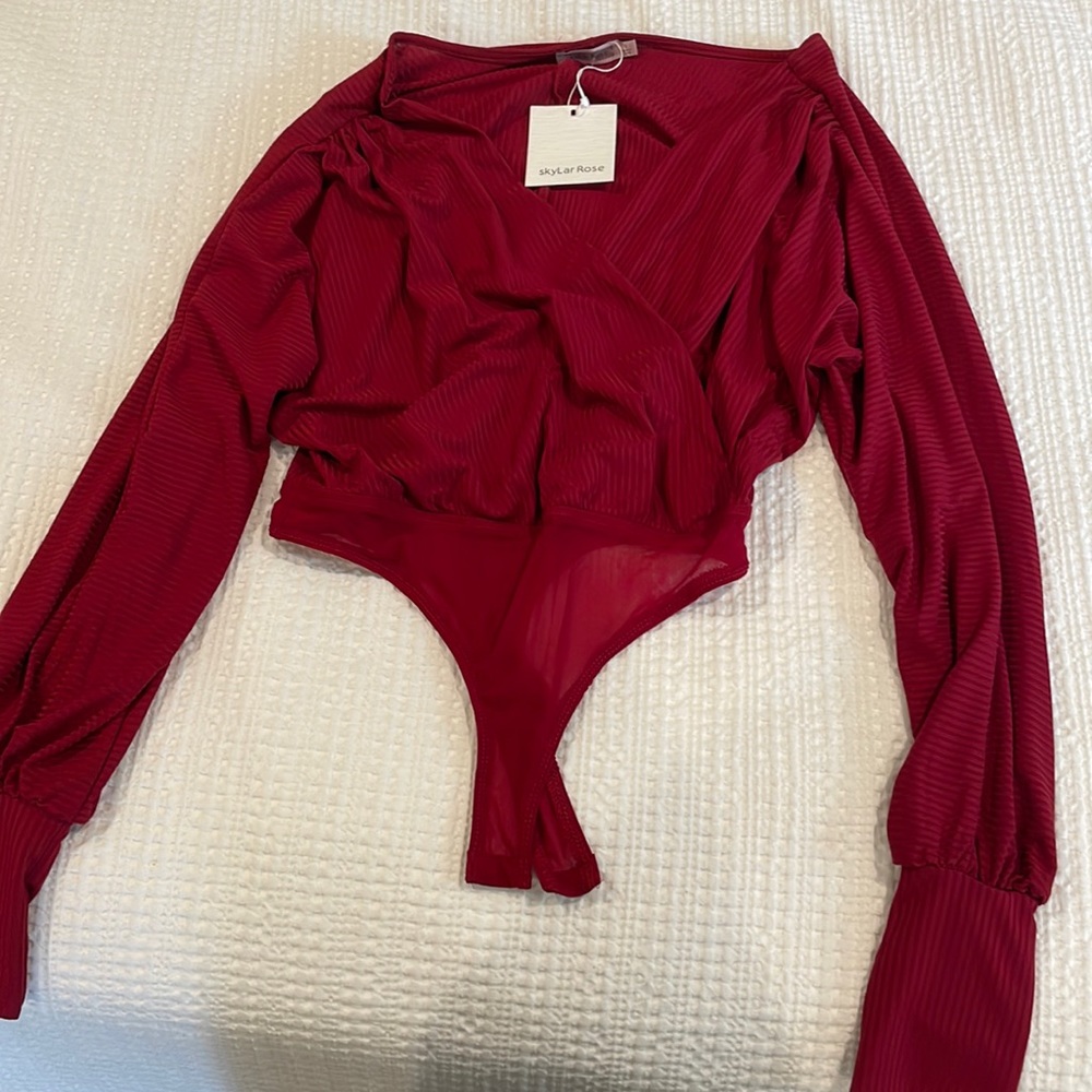 New red body suit